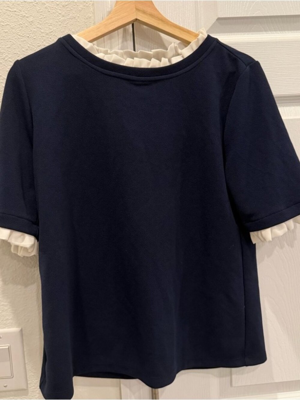 Navy Top with Cream Ruffle Trim